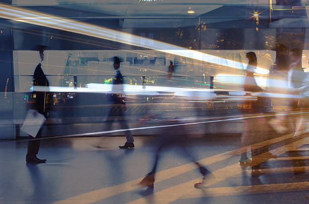 istock People walking in a busy city abstract background. 2235687888