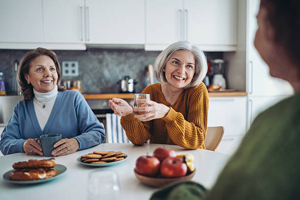 istock Group of mature women chatting at breakfast 2235688191