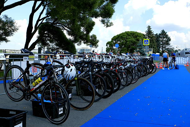 Russia Saint Petersburg July 26 2025. At the start of the triathlon competition, bicycles are in a special parking lot in front of the bike path.