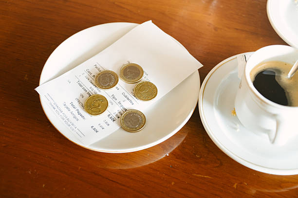 istock Receipt and change money in a cafe 2235692691