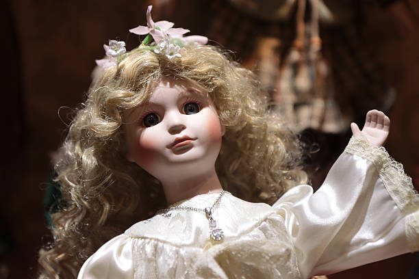 istock old nostalgic doll with close-up focus on face 2235693864