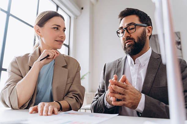 istock Business people discussing strategy during a meeting in the office 2235694573