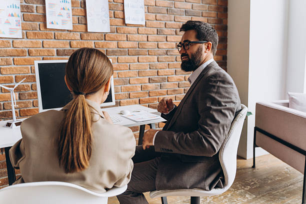 istock Business partners discussing renewable energy projects in modern office 2235694648