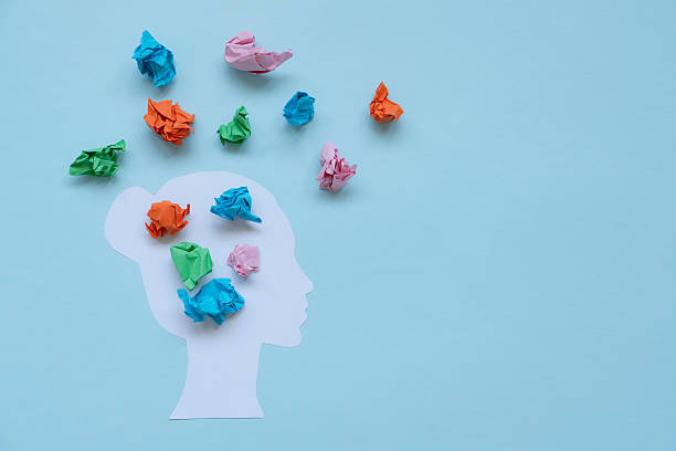 istock Positive thinking concept. Head shape and colorful paper balls 2235695423