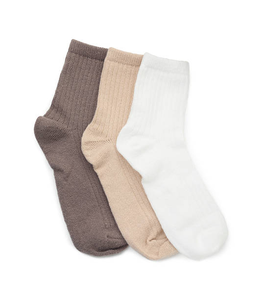 istock Pairs of soft socks isolated on white, top view 2235696216