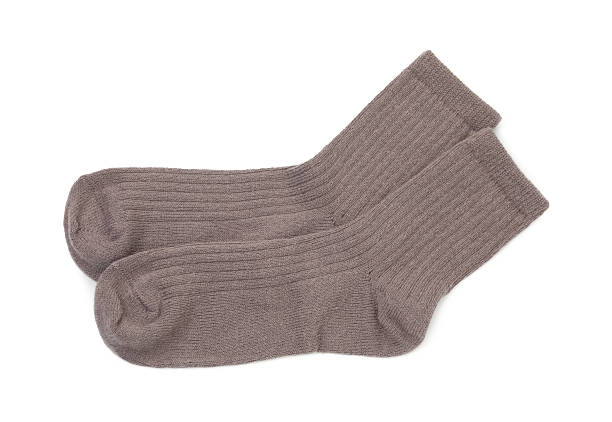 istock Pair of soft socks isolated on white, top view 2235696405