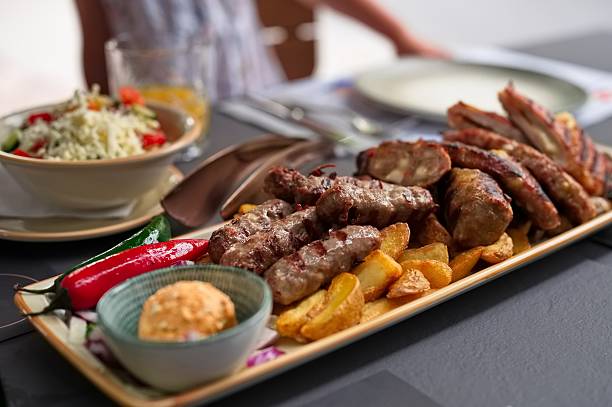 istock Minced meat dish with vegetables on the table 2235697490
