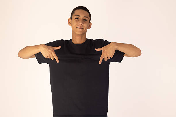 istock Man in black shirt pointing finger at camera 2235702918