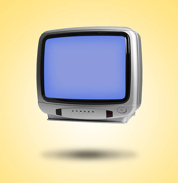 Retro TV set in air on golden background
