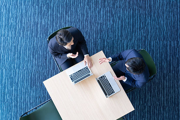 istock Businessmen discussing business in the office 2235716888