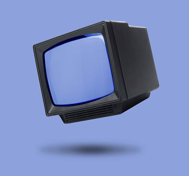 istock Retro TV set in air on violet blue background 2235716947