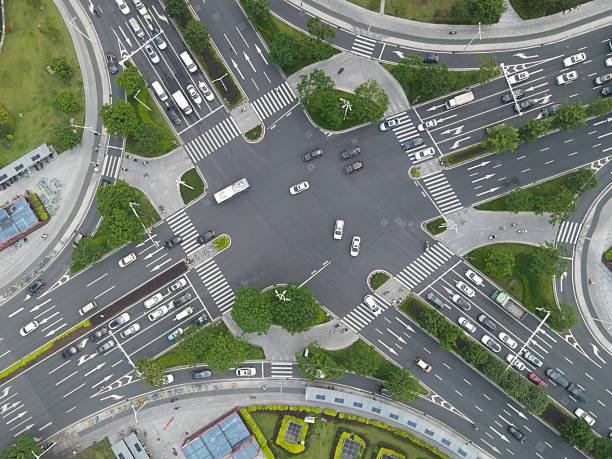 istock Asphalt crossroads with busy traffic 2235718714