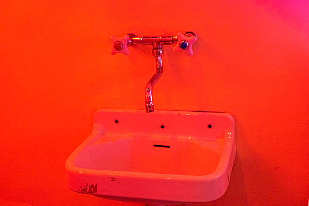 istock last century sink with a mixer on a red background in a room for developing photos and printing 2235724678