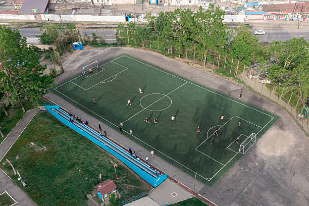 istock Elevated drone shot capturing a lively soccer match in a compact city setup, showcasing everyday life in Vladivostok, Russia 2235724984
