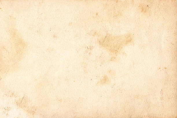 istock Antique Old Paper Texture Background. Vintage stained document paper. Brown rustic parchment paper sheet with space for text 2235728411