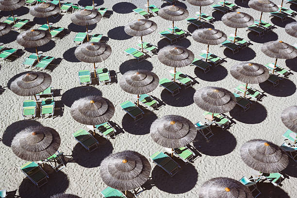 istock View from above on brown straw umbrellas 2235732681