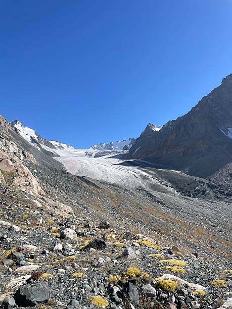 istock Mountain landscape with glacier and blue sky 2235733380