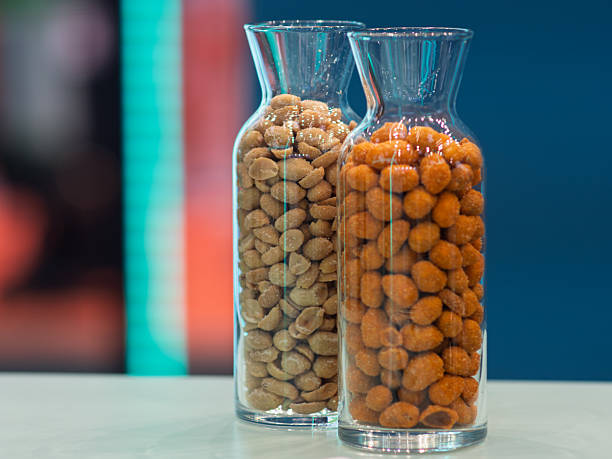 istock Peanuts in Clear Glass Jars: A Nutty Delight 2235737830
