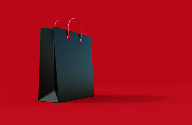 White shopping bag on red background. Shopping concept.