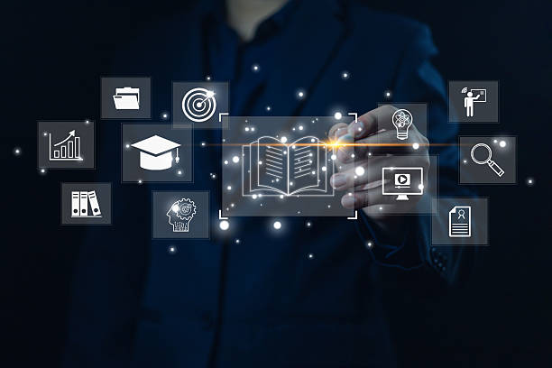 istock Digital learning concept with business person touching virtual icons of education, knowledge, e-learning, online training, innovation, and future technology for modern education. e-learning, online 2235741756