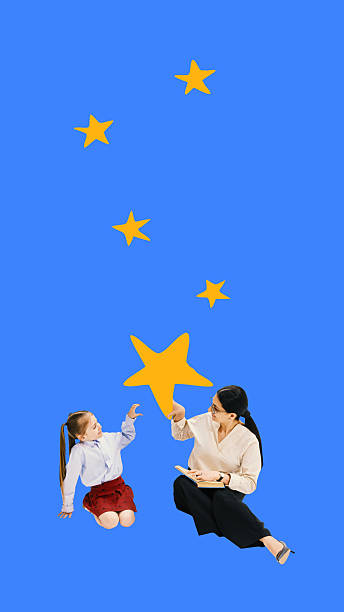 istock Collage with teacher and student reaching yellow star on blue background 2235742466