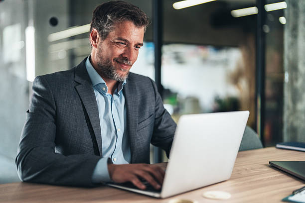 istock Confident businessman in his office 2235745535