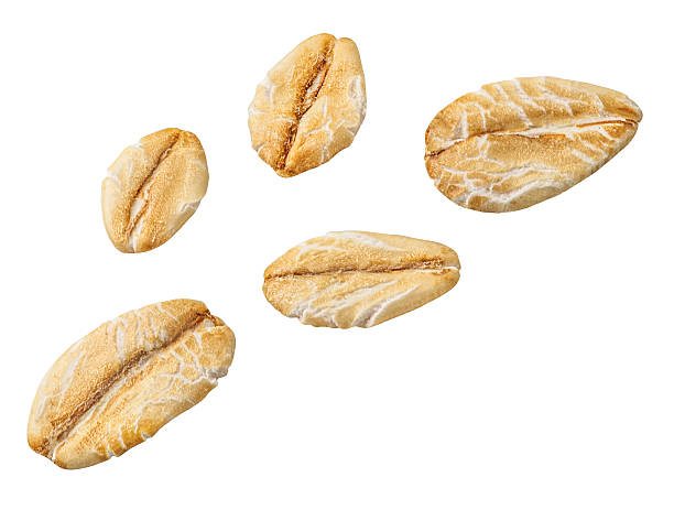 istock Levitating Oat flakes isolated on white background.Rolled oat flakes falling in the air. Flying oats Explotion. Pattern 2235748628