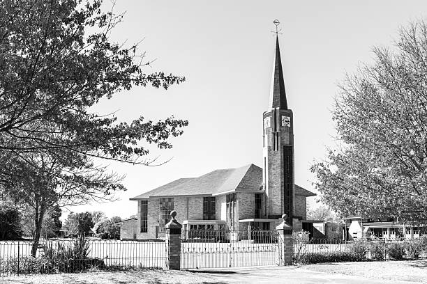 Petrus Steyn, South Africa - May 26, 2025: The Dutch Reformed Church in Petrus Steyn, built with bricks. Monochrome