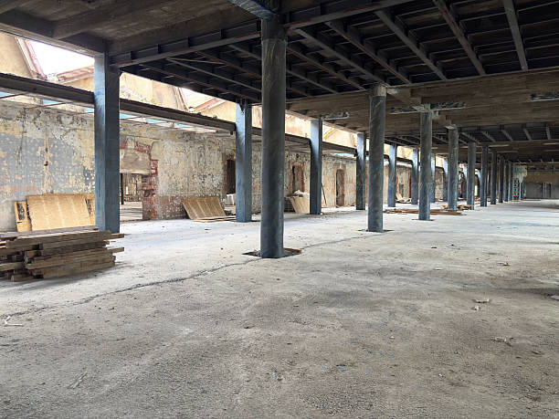 istock Large abandoned industrial building interior 2235749795