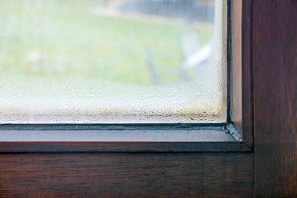 istock Condensation forming on a wooden window frame 2235752276