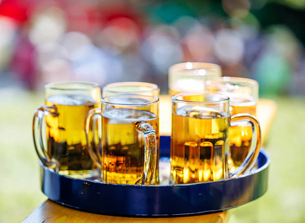 istock Tray of refreshing cold draft beers with bright bokeh background 2235758403