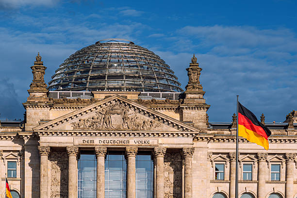 Berlin Reichstag Dome at Sunset. Modern monument with spiral walkways to the top of the Reichstag, Germany's parliament building in the heart of Berlin, Central Berlin, Germany.