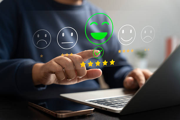 istock Experience excellent customer service, User give five star rating on online application, Positive feedback, Happy, Smiley face icon. Customer Reviews in Digital Survey, Satisfaction. 2235759909