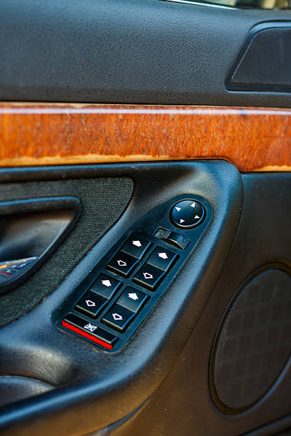 istock Interior of a German retro car. Wooden elements in the car interior 2235760331