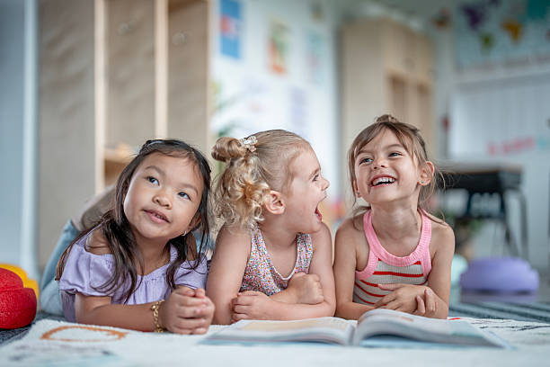 istock Smiling Children Engaged in Learning Together in a Colorful Classroom 2235761012