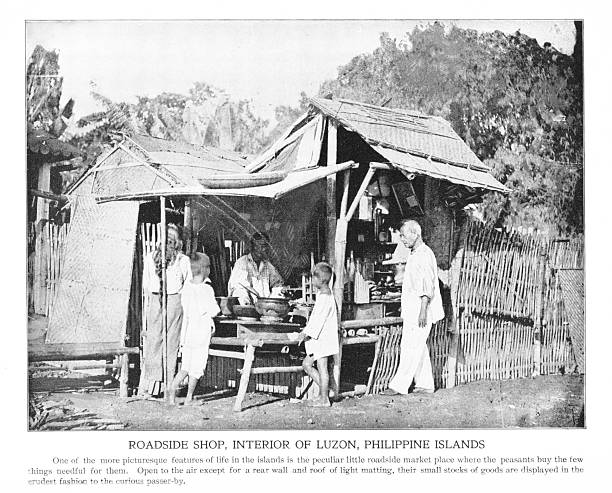 A store  in rural area with only one wall in back and the rest of the shop open, Luzon Island, one of the  Philippine Islands, an archipelago in the Pacific Ocean. Photograph engraving published 1898. Copyright expired; artwork is in Public Domain.