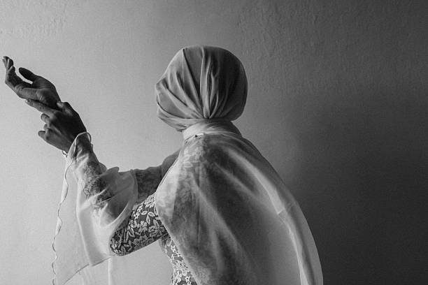 istock Black and white image of a veiled woman in an elegant pose 2235764188