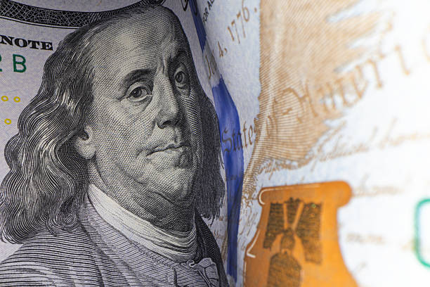 istock Close-up of Benjamin Franklin on 100 Dollar Bill 2235765561