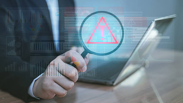 istock Businessman using tablet with warning alert icon, cyber security, risk management, and data protection in digital business. 2235766208