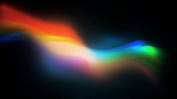 Vibrant light wave effect on black background. Abstract artistic background. Digital noise was added to emphasise the creativity and aesthetics of the image