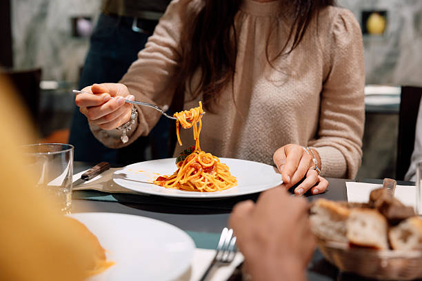 istock Typical italian pasta plate, spaghetti with tomato sauce and fresh basil 2235767277