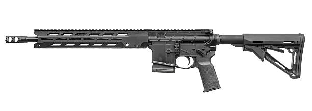 istock A black tactical carbine rifle with an adjustable stock and a handguard. 2235771040