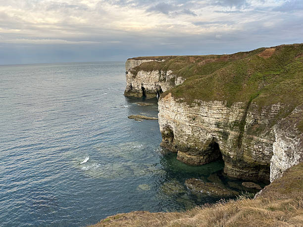 istock Cliffside Coastal Landscape with Geological Formations 2235773046