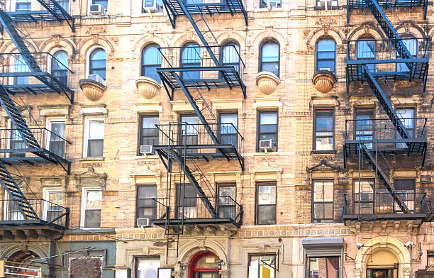Typical New York apartment building with fire escapes