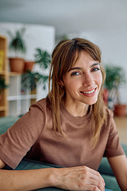 istock Confident businesswoman smiling while working from home office 2235775426