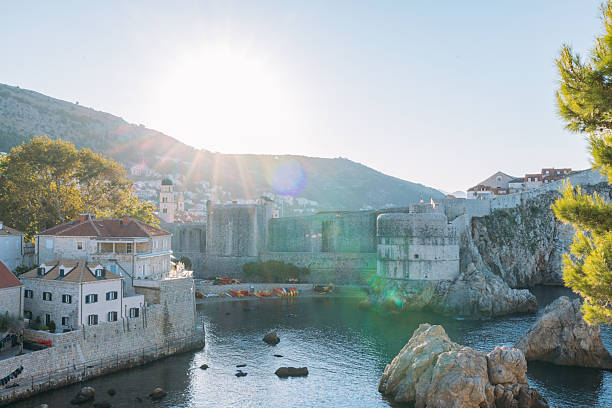 istock Coastal Fortress with Sunlit Rocky Cliffs 2235775944