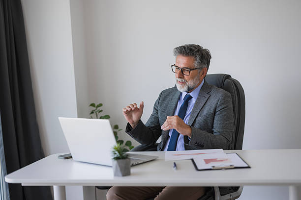 istock Senior businessman having a video call in his office 2235776715