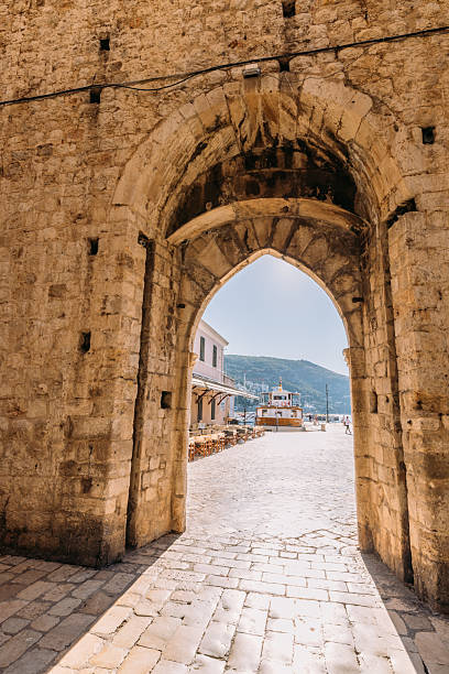 istock Historic Stone Archway Overlooking Harbor Dock 2235777128