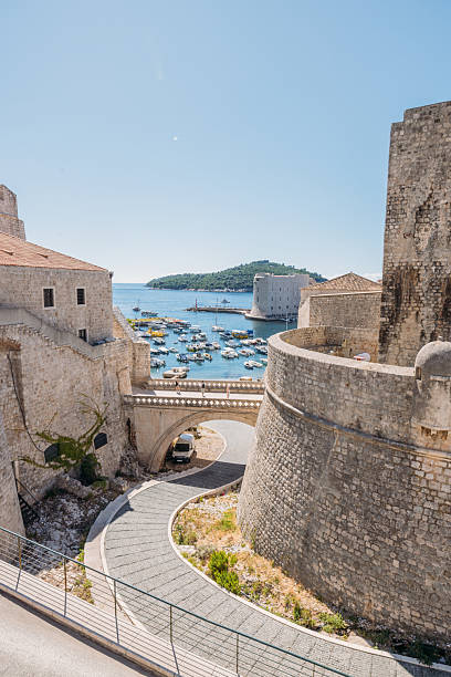 istock Historic Coastal Fortress Overlooking Harbor Boats 2235777455