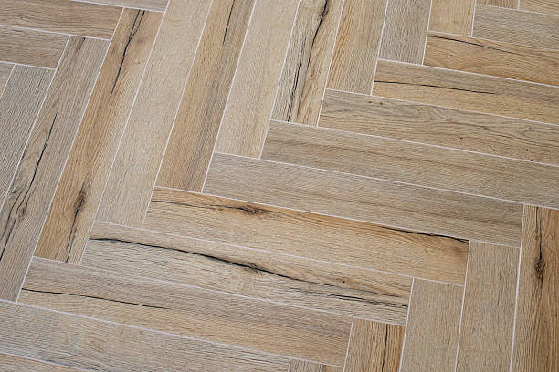 istock Herringbone floor made of tile rectangles resembling wood planks 2235778547